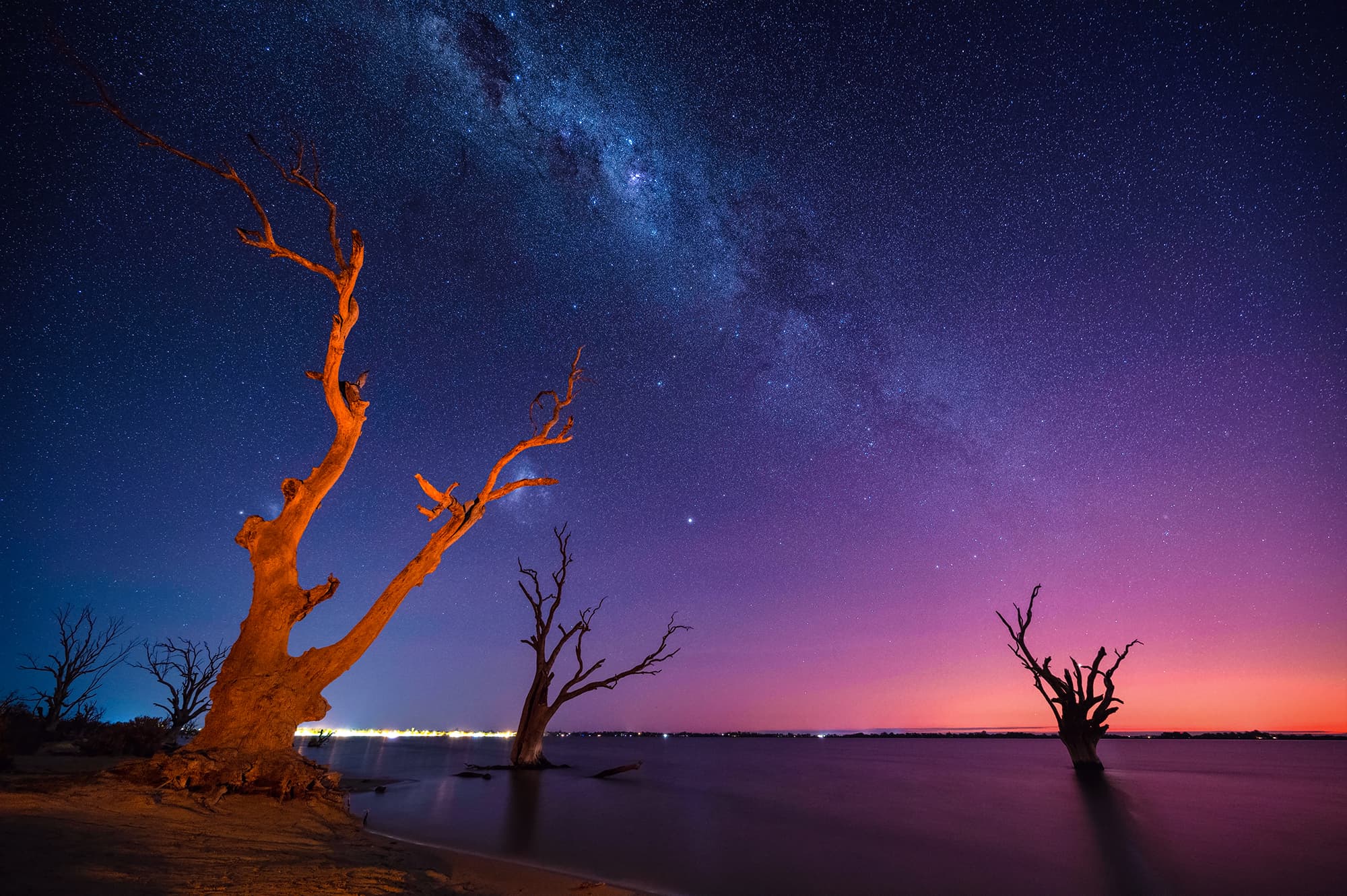 Stars emerging over a volcanic twilight sky at Lake Bonney, South Australia